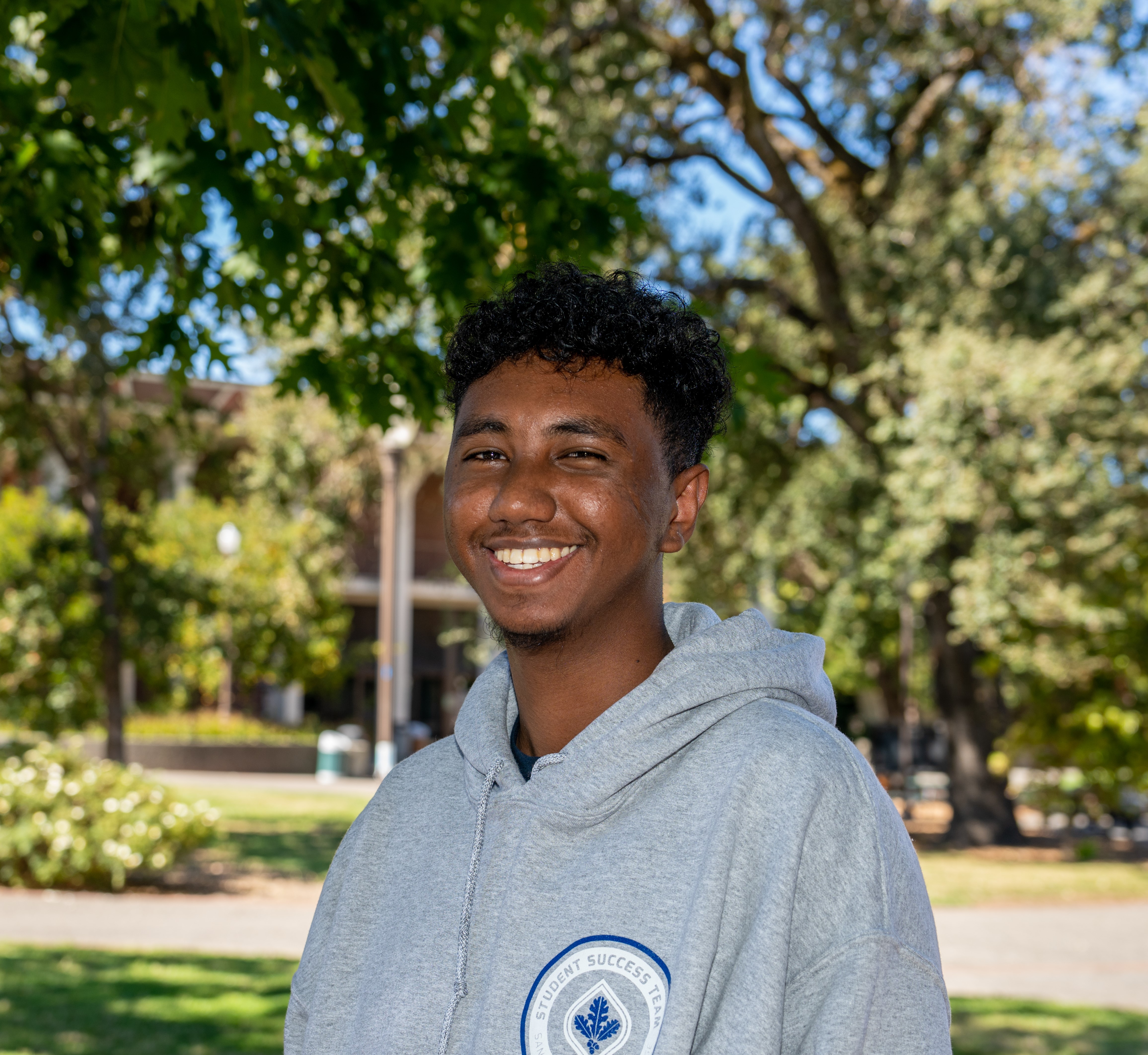 headshot of Aminadab, a peer coach