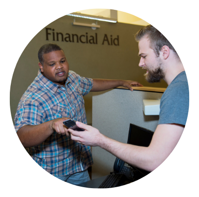 male student with Financial Aid Specialist                                    