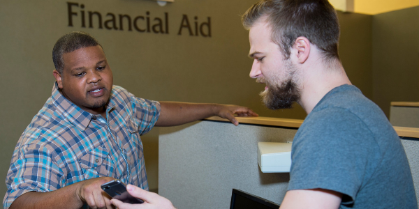 Financial Aid Specialist Helping Student