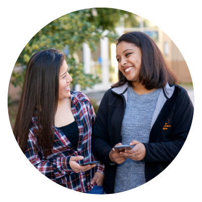 Two students on their phones